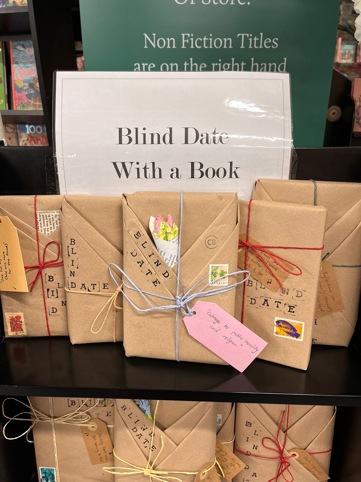 Chapters Blind Date Book.Blind date with a book wrapped in brown paper with ribbon and clue card"